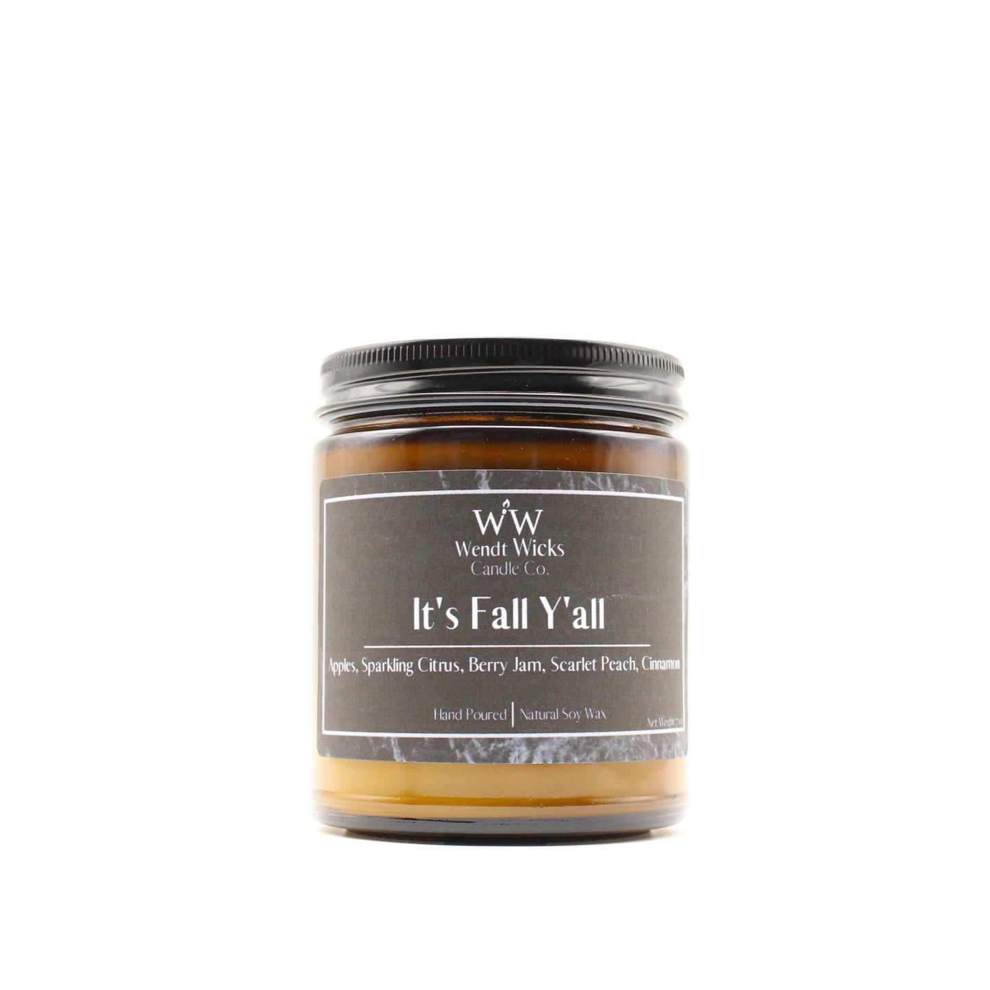Amber glass candle jar labeled 'It's Fall Y'all' by Wendt Wicks Candle Co. with a black label on a white background