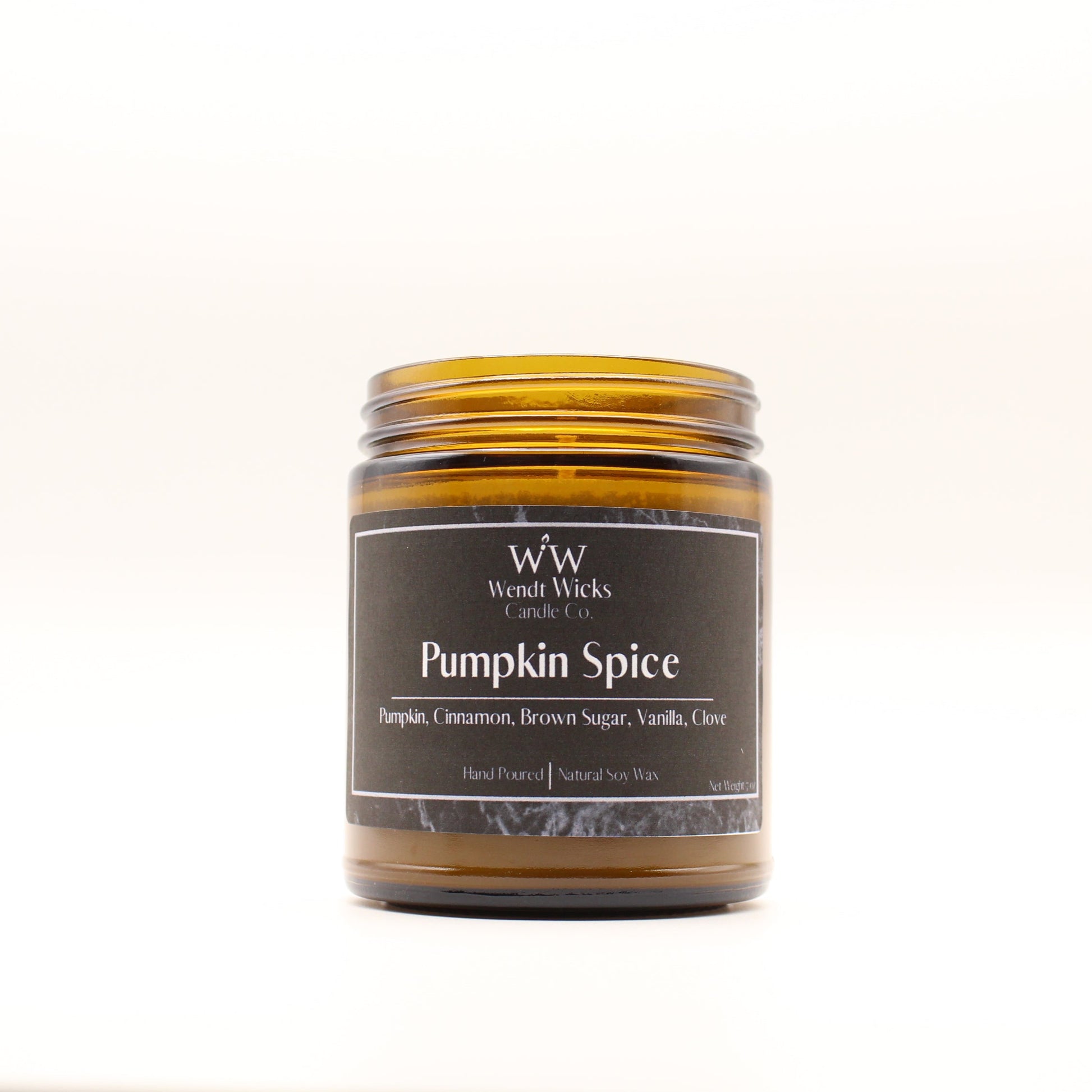 Wendt Wicks amber glass jar candle. Candle labeled 'Pumpkin Spice' on a white background